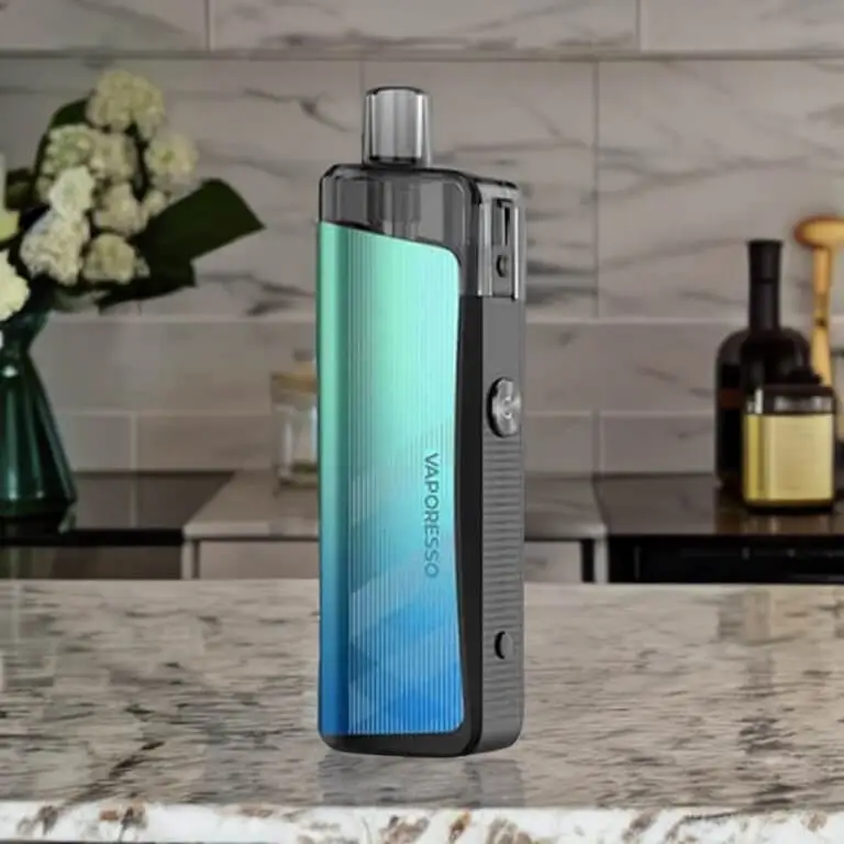 Vaporesso Gen Air 40 in aurora green on a marble kitchen countertop.